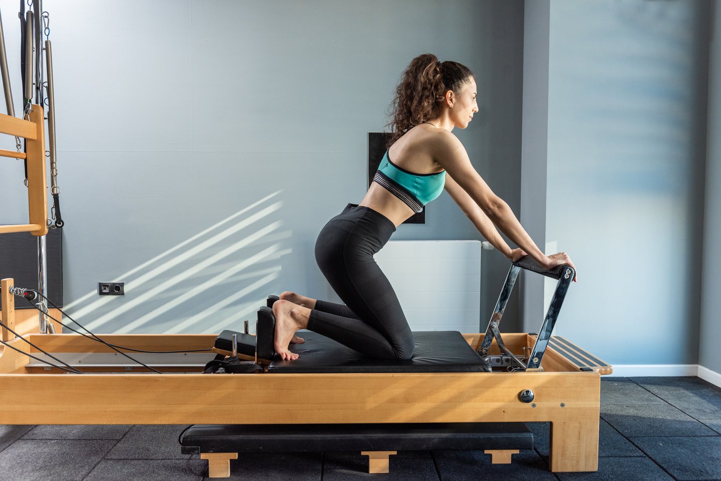 Pilates exercise on pilates machine